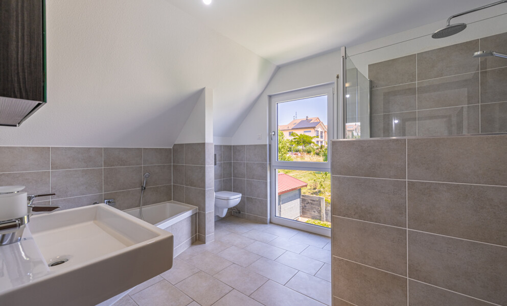 Exclusivité Proximmo - Villa individuelle Minergie 5.5 pièces à Bavois avec jardin, terrasse et garage double